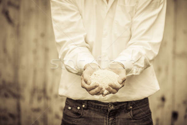 Farmer Showing Animal Dry Food Stock photo © aetb