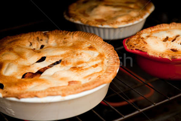 three apple pies cooking in the oven Stock photo © aetb