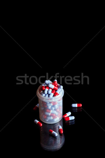 Container full of pills Stock photo © aetb