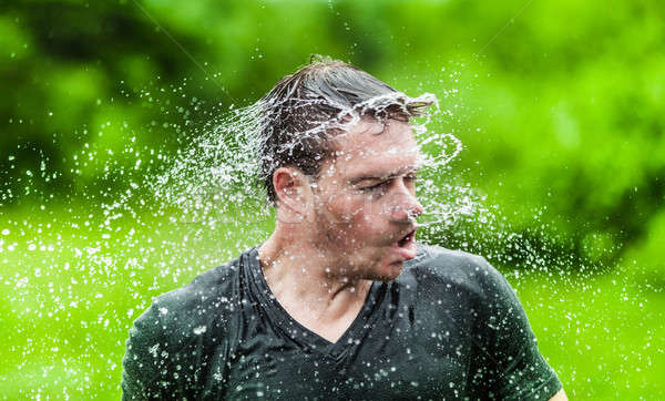 Young Adult Completely Drenched Shaking His head Stock photo © aetb
