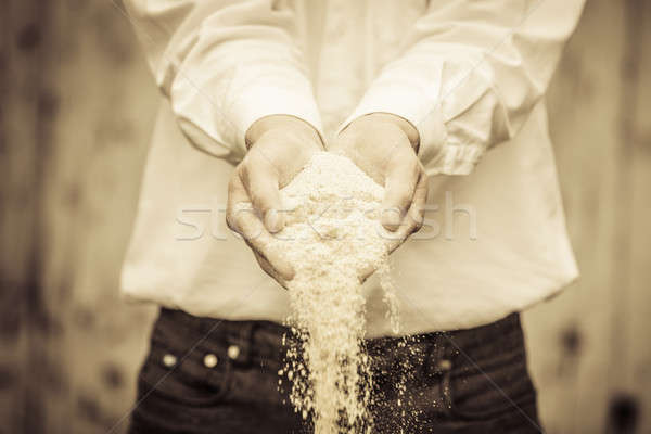 Farmer Showing Animal Dry Food Stock photo © aetb