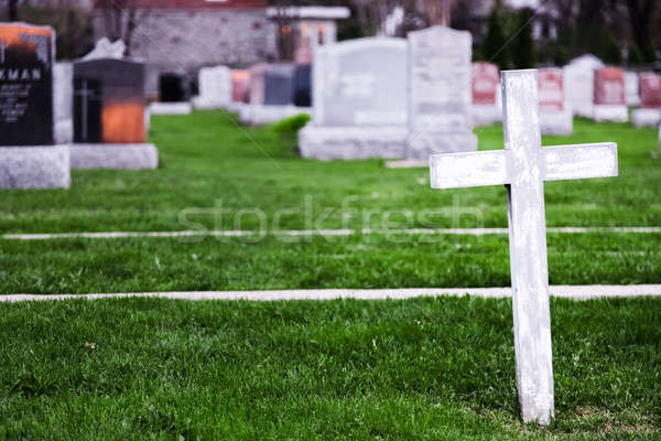 White Cross in a Old Cemetery Stock photo © aetb