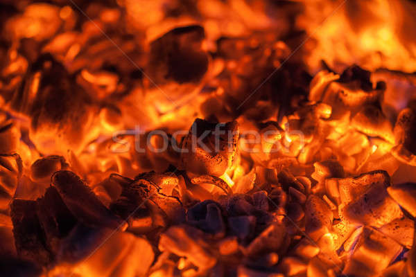 Bright Orange Embers in a wood Stove Stock photo © aetb