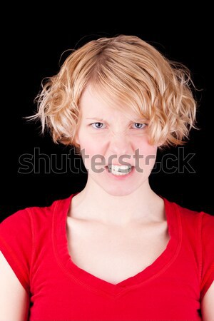 Very angry girl on black background Stock photo © aetb