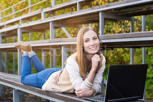 студент спорт ноутбук закат солнце ноутбука Сток-фото © Agatalina