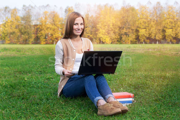 étudiant séance herbe verte portable été [[stock_photo]] © Agatalina