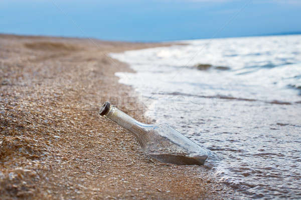 Sealed bottle near sea Stock photo © Agatalina