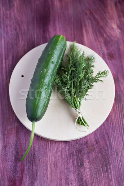 One fresh cucumber and bunch dill Stock photo © Agatalina