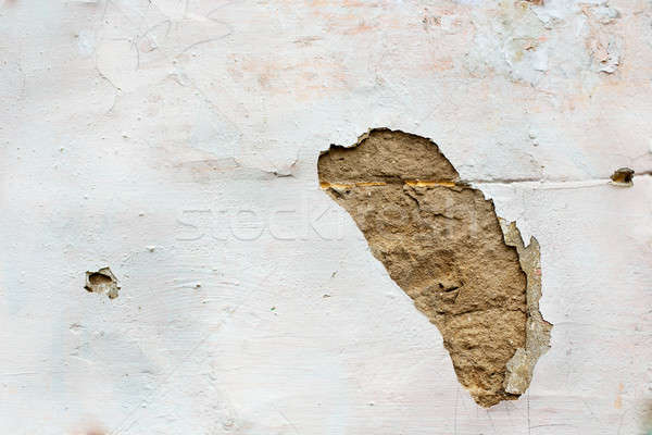 Hole in wall plaster Stock photo © Agatalina