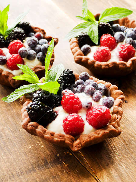 Tartlets with cheese and berries Stock photo © AGfoto