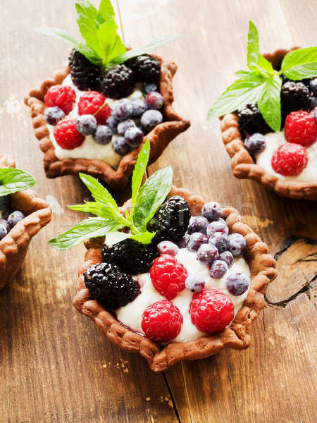 Tartlets with cheese and berries Stock photo © AGfoto