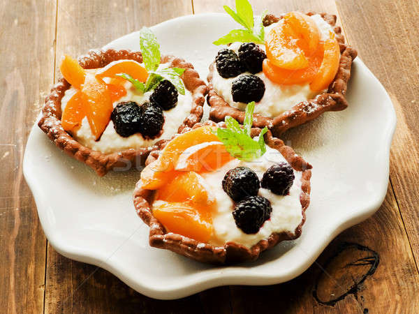 Tartlets with cheese and berries Stock photo © AGfoto