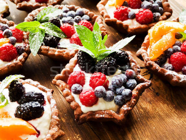 Stock photo: Tartlets with cheese and berries