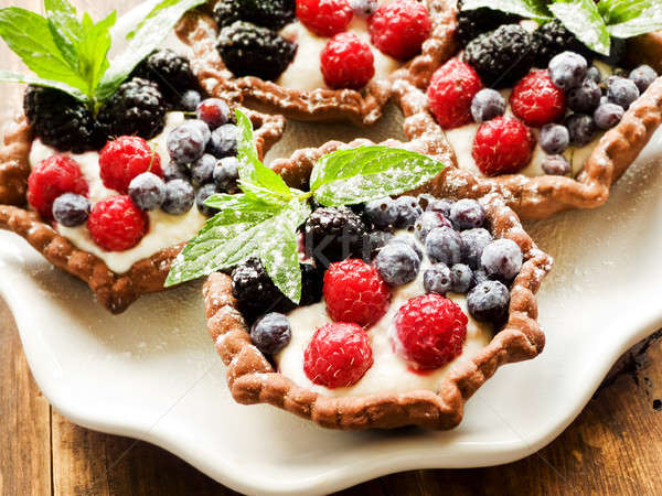 Tartlets with cheese and berries Stock photo © AGfoto