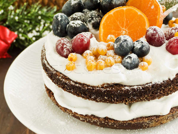 Tél torta karácsony gyümölcstorta tejszínhab gyümölcsök Stock fotó © AGfoto
