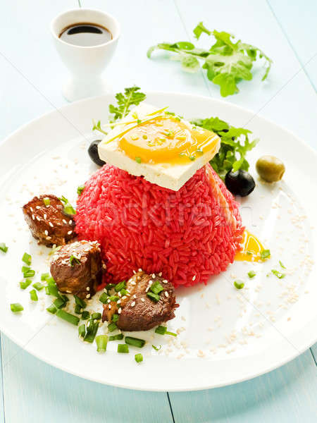 Rice with tofu and egg yolk Stock photo © AGfoto
