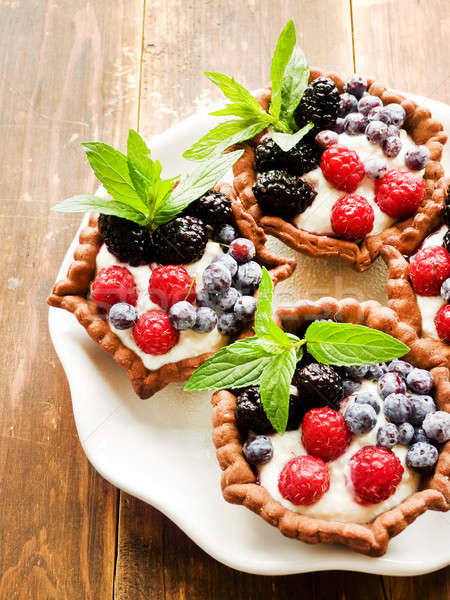 Tartlets with cheese and berries Stock photo © AGfoto