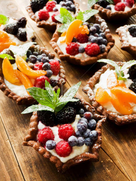 Tartlets with cheese and berries Stock photo © AGfoto