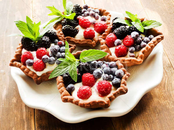 Tartlets with cheese and berries Stock photo © AGfoto