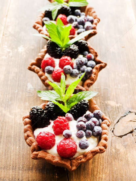 Tartlets with cheese and berries Stock photo © AGfoto
