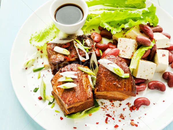 Pork ribs with soy sauce and beer Stock photo © AGfoto