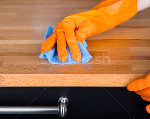 Reinigung Tabelle Gummi Hand home blau Stock foto © AGorohov