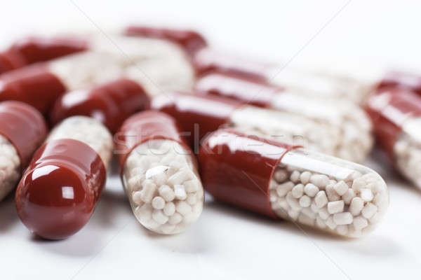Pilules macro vue blanche sport Photo stock © AGorohov