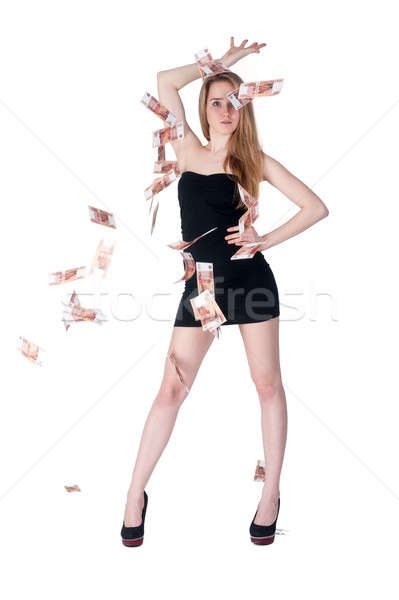 Beautiful young lady among flying cash Stock photo © Aikon