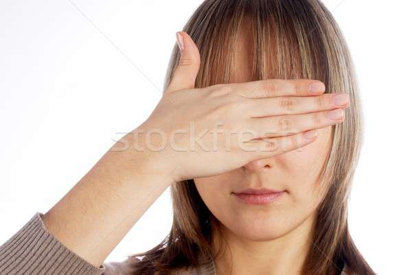 Woman covering eyes Stock photo © Aikon