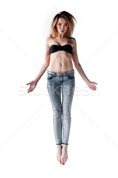 Mooie vliegen meisje jeans beha jonge Stockfoto © Aikon