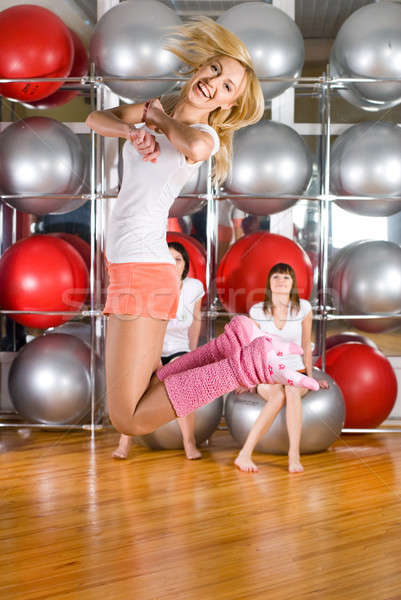 Pretty girls in fitness center Stock photo © Aikon