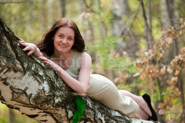 Women and little girls on nature background