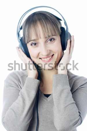 Mulher escuta música mulher bonita fones de ouvido alto Foto stock © Aikon