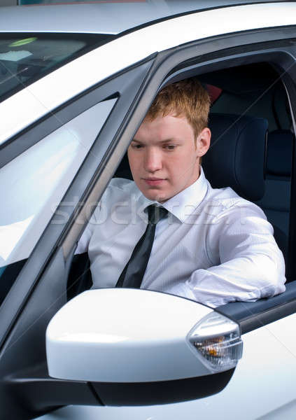 Condução homem moço carro posição Foto stock © Aikon