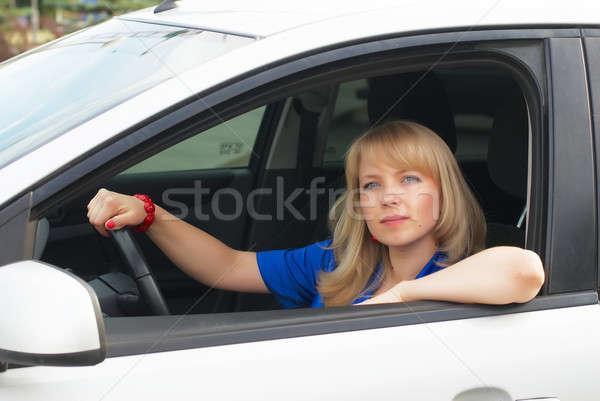 Young woman in car Stock photo © Aikon