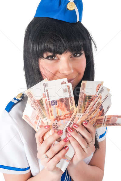 Young beautiful air hostess with cash Stock photo © Aikon