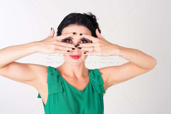 Woman covering eyes Stock photo © Aikon