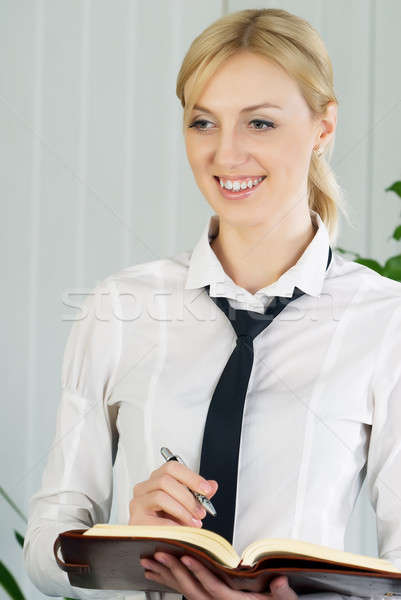 Pretty businesswoman with presentation Stock photo © Aikon