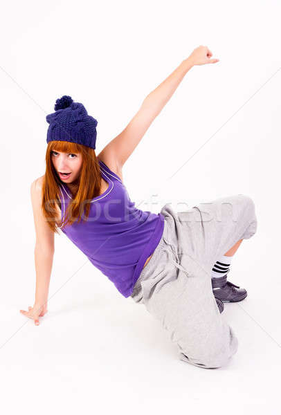 Csinos hiphop táncos fiatal gyönyörű nő tánc Stock fotó © Aikon
