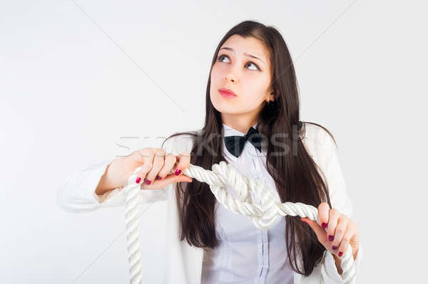 Stock photo: business woman with knot of 
