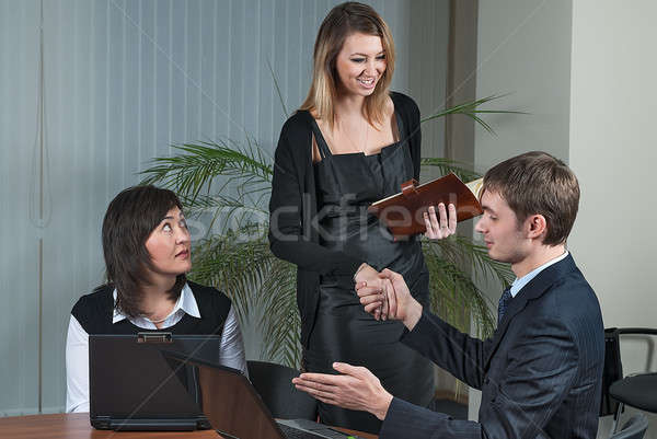 businessman congratulate young businesswoman Stock photo © Aikon