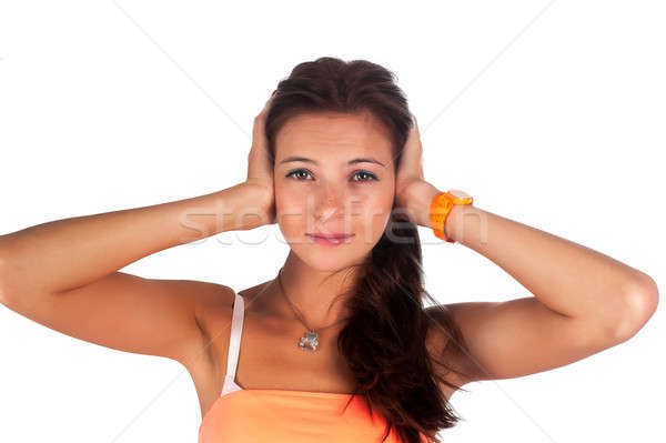Hear no evil. Young pretty woman covering her ears Stock photo © Aikon