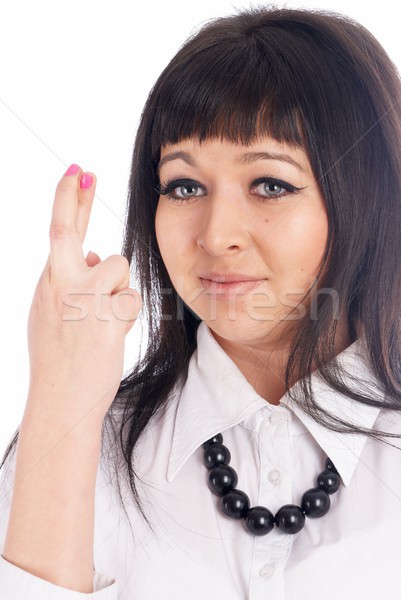 Csinos lány ujjak vonzó fiatal nő mutat Stock fotó © Aikon