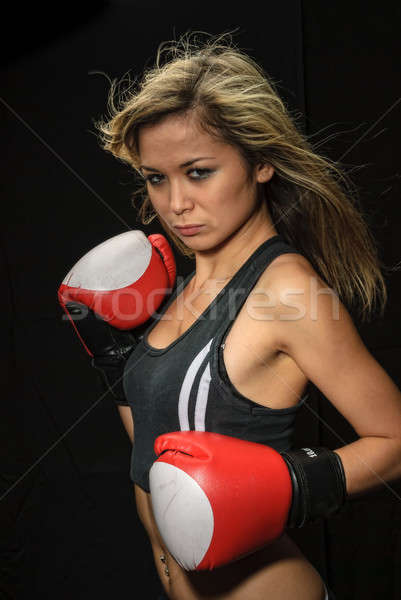 Sexy young blond woman with red boxing gloves Stock photo © Aikon