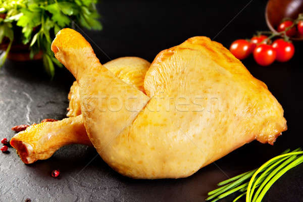 Raw and fresh meat. Uncooked chicken thighs.Feed and food Stock photo © Ainat