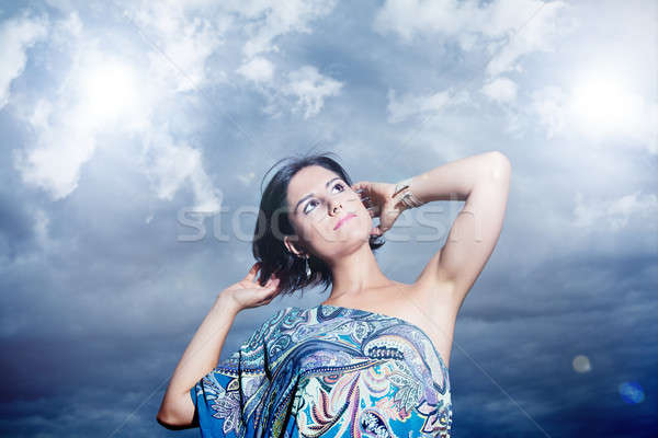 Belle jeune femme ciel nuages pureté Photo stock © Ainat