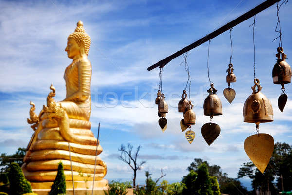 Row of golden bells in buddhist temple. big buddha in Thailand. Travel to Asia,  Stock photo © Ainat