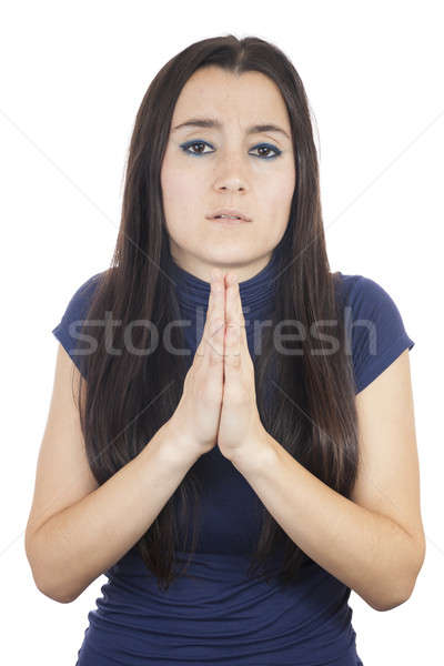 Genç kadın bakıyor kamera kız dua eden Stok fotoğraf © Aitormmfoto