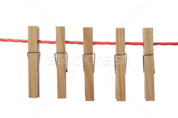 Molletta cinque legno fila isolato Foto d'archivio © Aitormmfoto