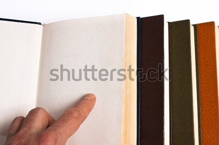 Könyvek könyv kéz mutat üres lap papír Stock fotó © ajfilgud